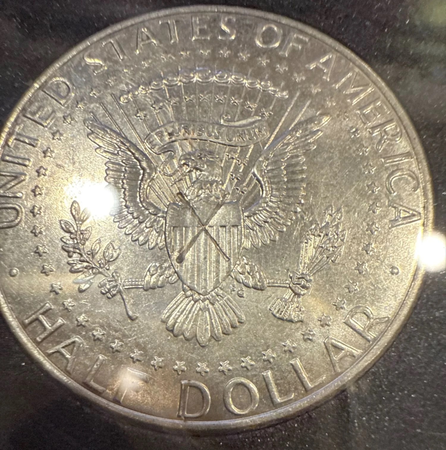 2021-D Kennedy half dollar die chip error showing raised lump caused by broken die fragment