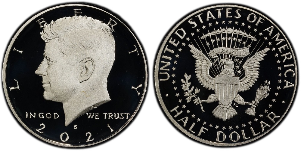2021 Kennedy half dollar grading strip showing four condition tiers from worn to gem MS67 quality